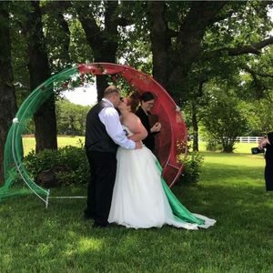 Custom made wedding dress. Green fabric inserts, corset back